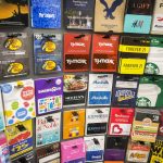 colorful credit gift cards and shopping bags displaying rewards benefits