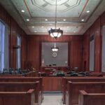 Professional attorney Brody Shulman in courtroom with judge and legal documents