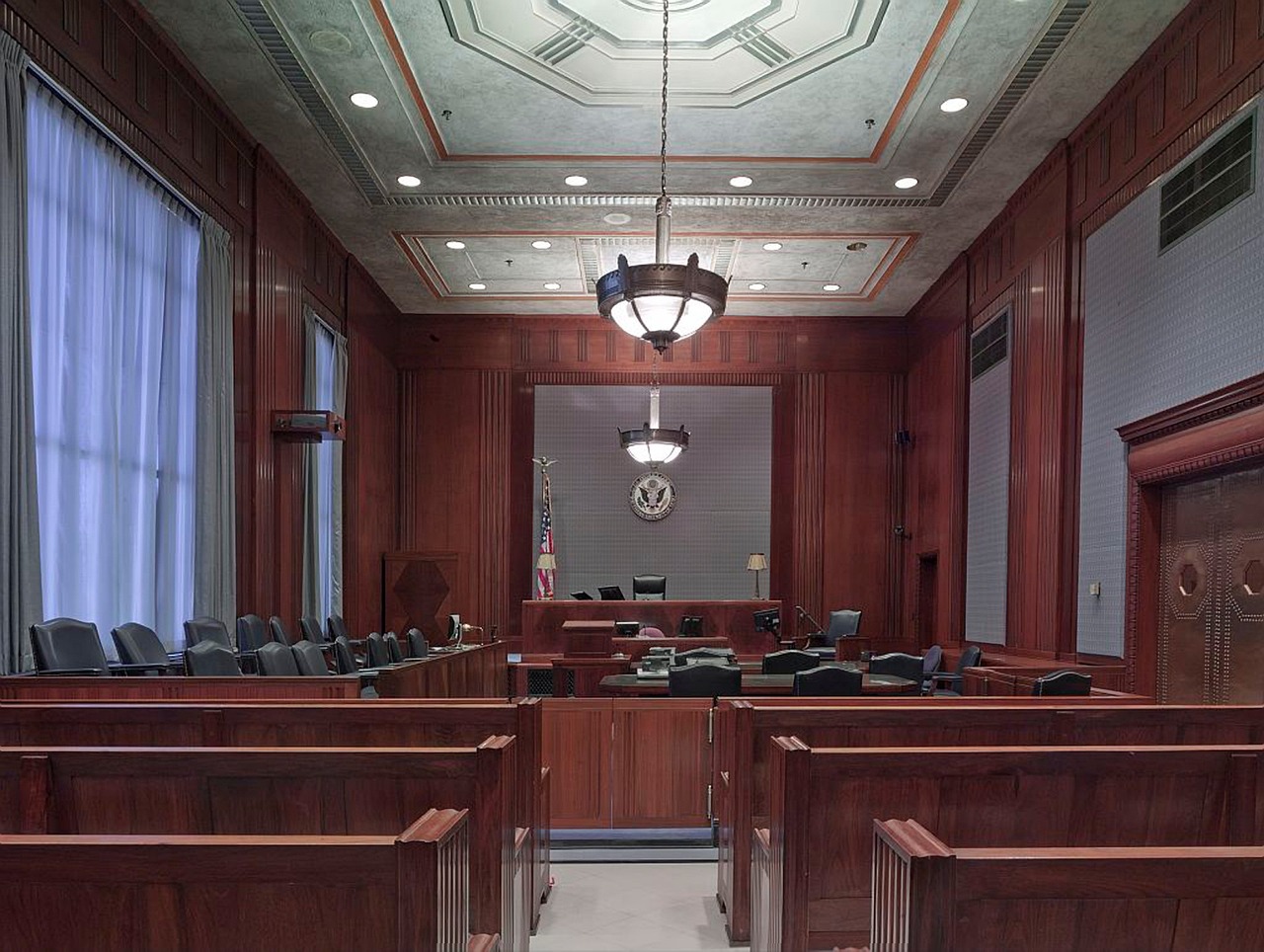 Professional attorney Brody Shulman in courtroom with judge and legal documents