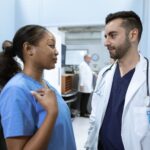 Professional healthcare leader in medical setting focused on patient wellness innovation