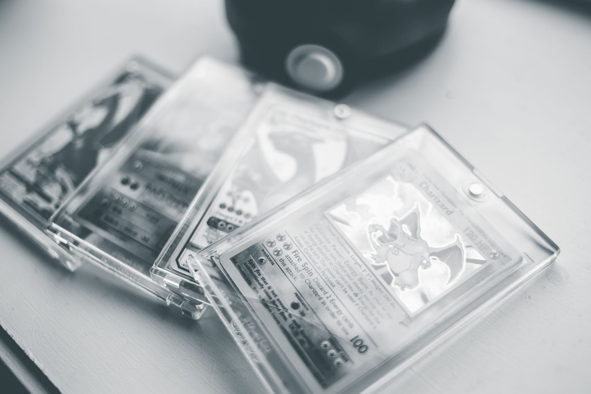 High-quality TAG graded Charizard Pokémon trading card in protective case