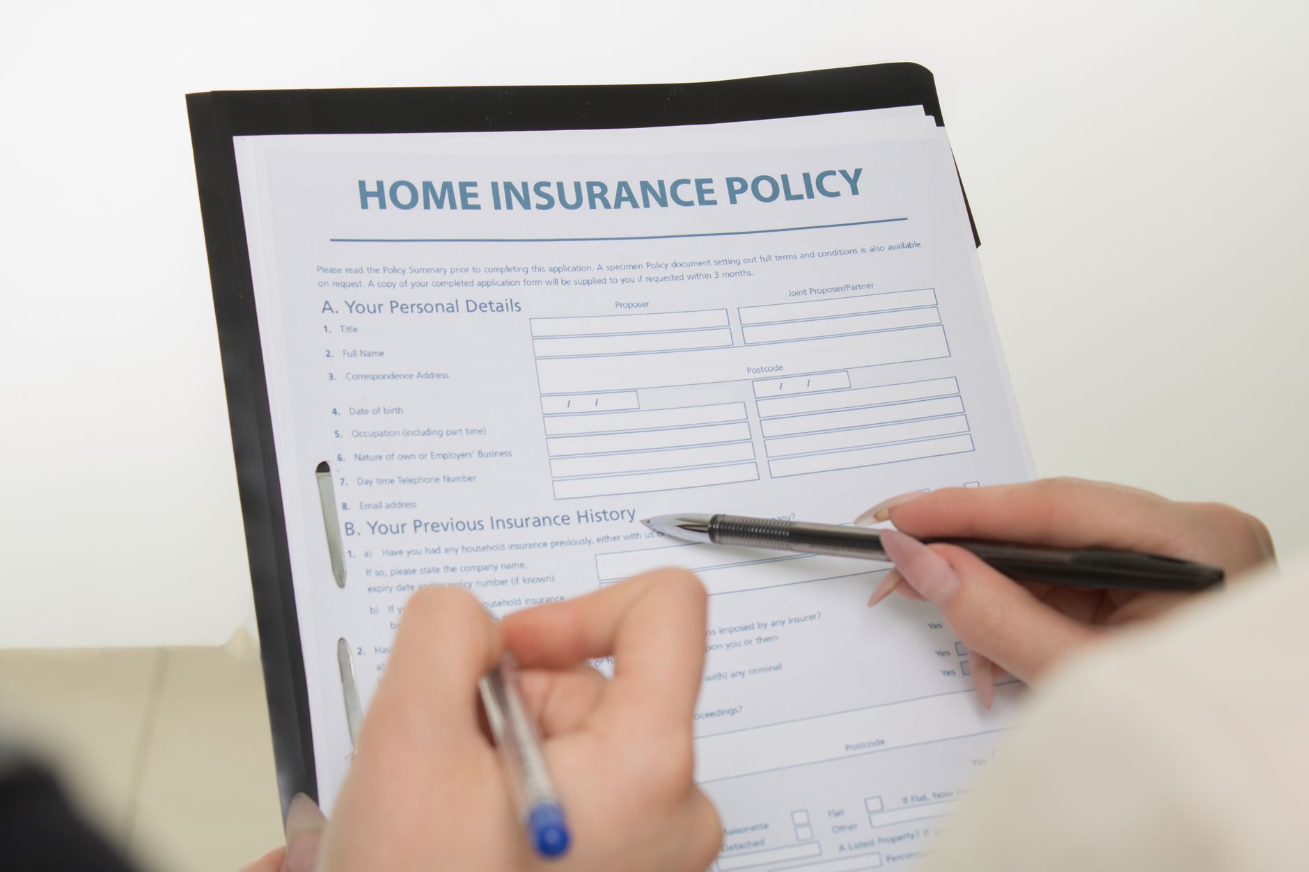 Insurance policy document with highlighted coverage details and clarification notes