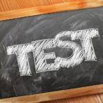 Professional conducting asbestos testing inspection in residential home
